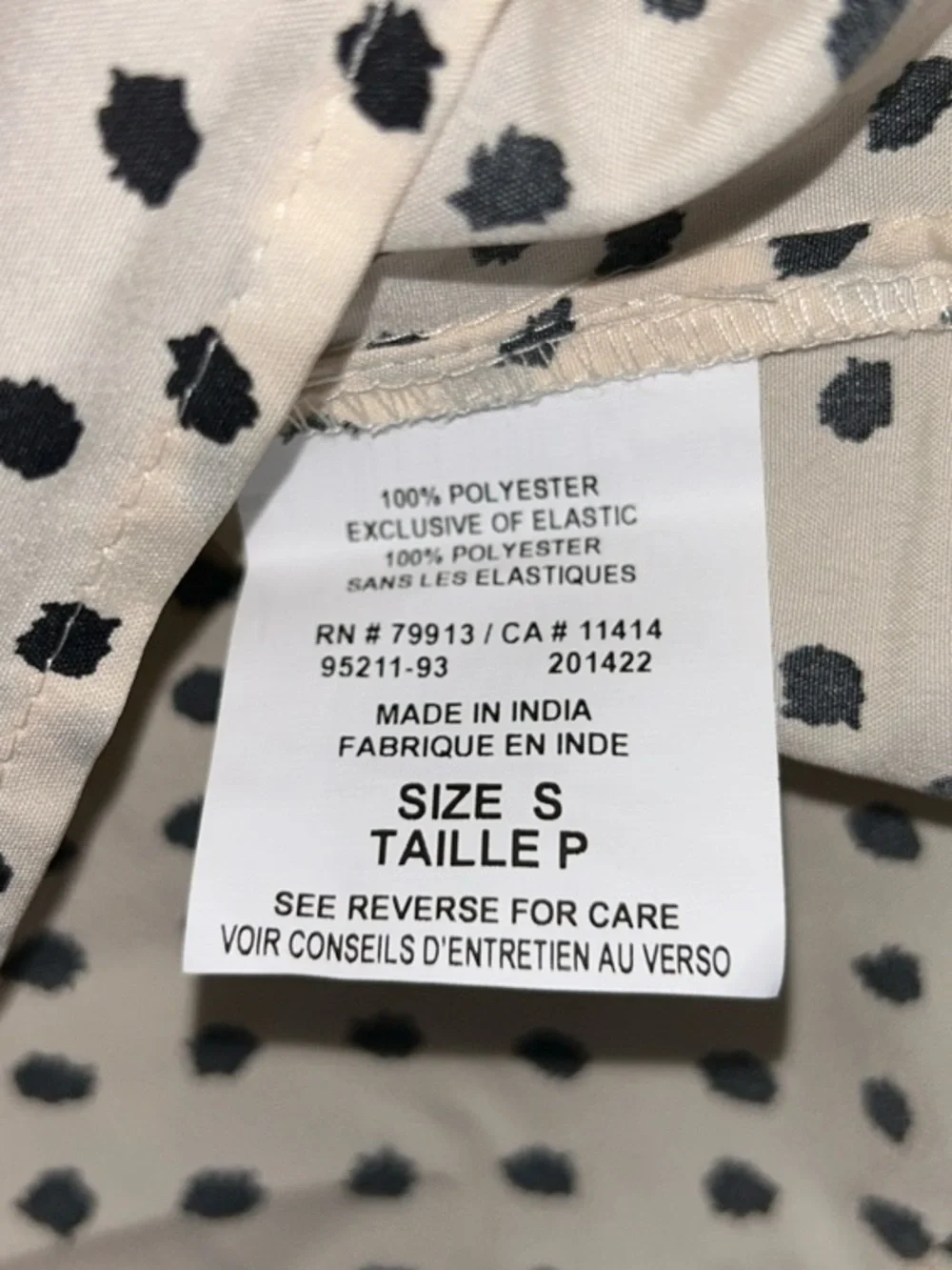 Motherhood Maternity Cream Dress with Black Polka Dots and Ruffle V-Neck - Picture 9 of 9